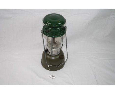 A British Military Issued 1973 Vapalux Storm Lantern. Marked To The Base With The Broad Arrow.