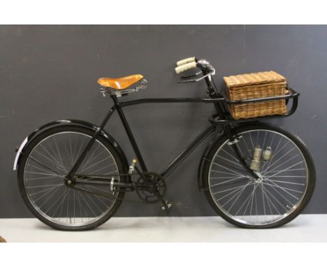 Shop Delivery / Butchers Bicycle, registration number. 724921, with brown leather sprung seat and wicker basket to front toge