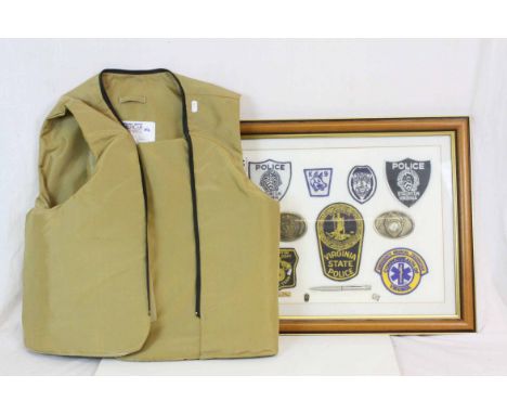 Framed, Glazed and Mounted Montage of Staunton Virginia Police Items including Seven Cloth Badges, Two Brass Belt Buckles, Pe