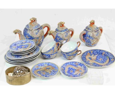 Japanese Handpainted Part Tea Service decorated with Dragons comprising Teapot, Milk Jug, Sugar Bowl, 4 Tea Cups, 5 Saucers a