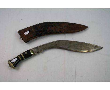 A Vintage Nepalese Kukri Complete With Original Scabbard.