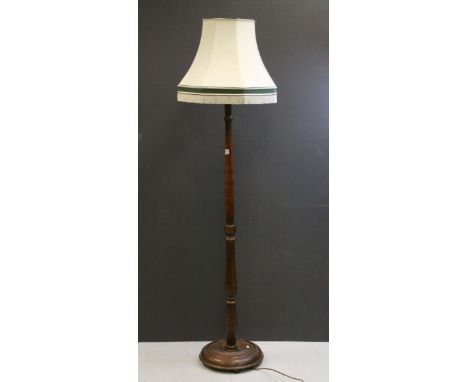 Early 20th century Copper and Leather Em,bossed Stickstand together with an Oak Standard Lamp
