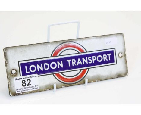 Small vintage "London Transport" Enamel plaque, approximately 8.25 x 3 inches