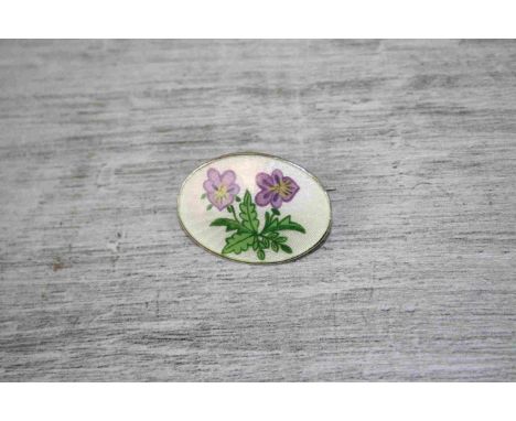 Early 20th century enamelled silver oval brooch, possibly Scandinavian, guilloche white enamel with viola flower decoration, 