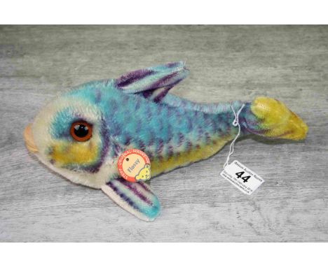 Vintage Steiff Flossy fish soft toy, circa 1960s/1970s with original card tag, blue yellow and purple colourway, length appro
