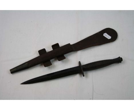 A British Military Issued Fairbairn Sykes Commando Dagger / Fighting Knife Complete With Original Sheath. Marked With The Bri