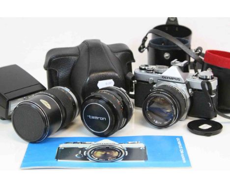 Olympus OM-1 Camera in Case together with Two Lens, Flash and other Accessories