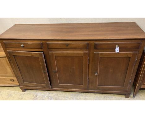 A French cherrywood buffet, width 192cm, depth 54cm, height 110cmCONDITION: Some light scuffing to the top and drawer front b