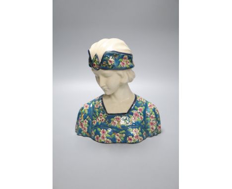 A French Art Nouveau style portrait bust, lady wearing head-dress, 26cmCONDITION: Structurally good although cream glazed ear