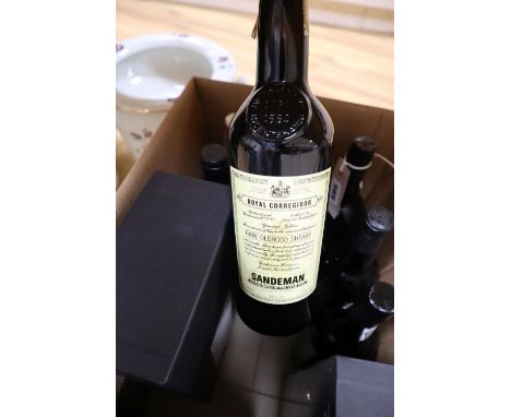 Eleven bottles of non-vintage port; four Graham's 19998/9, five Dow's Sandeman and Taylor's.