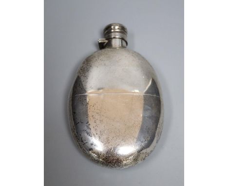 A late Victorian silver oval hip flask, Sampson Mordan &amp; Co, London, 1895, 14.2cm, gross 7oz.CONDITION: Large dent to the