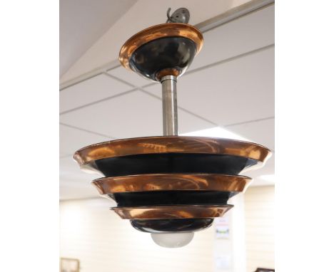 An Art Deco-style copper ceiling light