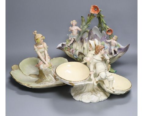 A Victorian Royal Worcester figural centrepiece, 20cm high, restored, an Austrian serving dish with central seated maiden, an