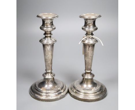 A pair of William IV silver pillar candlesticks, Sheffield 1832, Henry Wilkinson &amp; Co, 23.4cm, weighted.CONDITION: Both s