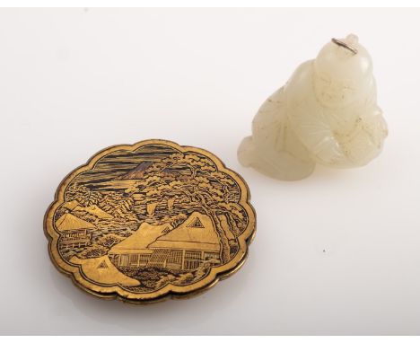 Two items to include a large Japanese Okomai brooch, showing buildings in a landscape and a jade? figure mounted as a pendant