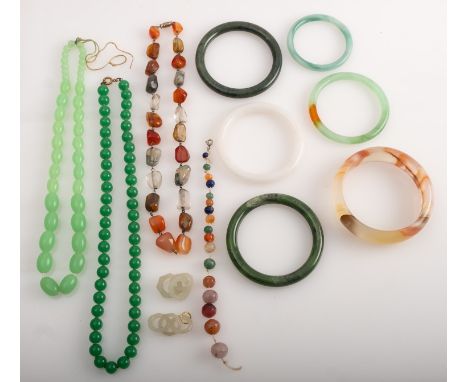 A mixed group of jewellery, to include six hardstone and 'jade' type bangles, two green bead necklaces, a multi-stone necklac
