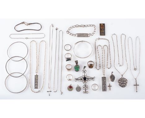 A large group of silver jewellery, to include ingot pendants, chains, cross pendant, rings, lockets, bangles, etc, and a silv