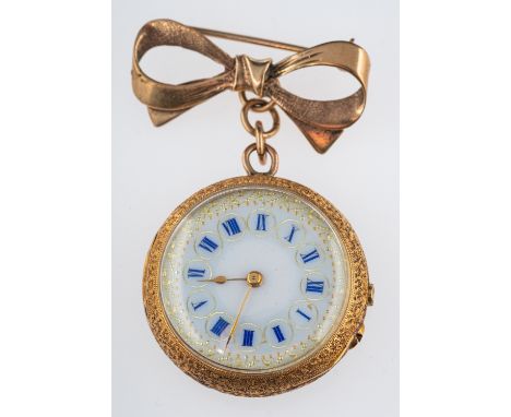 An early 20th Century pocket watch brooch, an ornately designed case with a guilloche enamel lily to verso, white ceramic dia