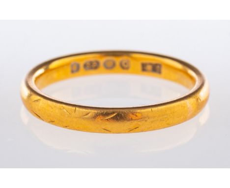 A 22ct yellow gold wedding band, UK hallmark, size K, 3.6grams.