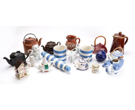 Two Cornishware mugs, a Cornishware rolling-pin, and a collection of various ceramic and teapots etc

