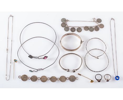 A mixed group of jewellery, to include two wire necklets with paste stones, two coin bracelets, four bangles, two paste stone