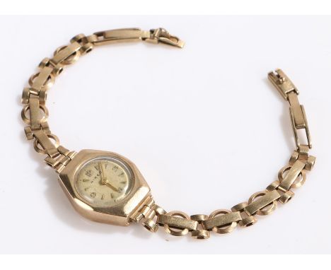 Hirgo 9 carat hold ladies wristwatch, the signed cream dial with Arabic and triangular markers, manual wound, the case 17.5mm