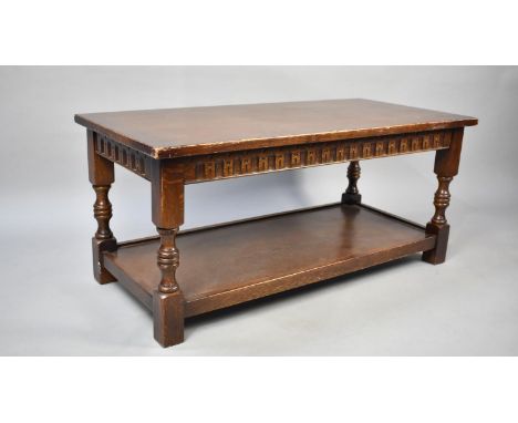 An Oak Rectangular Coffee Table with Stretcher Shelf, 101cms Wide 