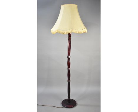 A Mahogany Standard Lamp with Shade 