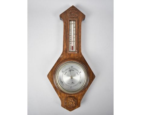 A Mid 20th Century Oak Aneroid Barometer, 40cms High 