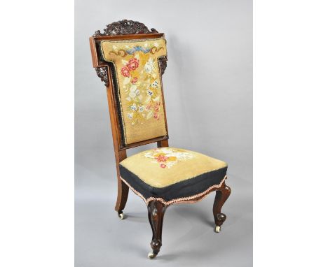 A Victorian Mahogany Framed Tapestry Upholstered Prie Dieu, the Back of T Shaped Form with Carved and Pierced Gallery of Scro