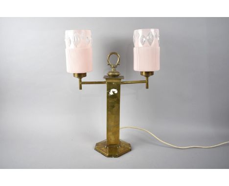 A Brass Two Branch Table Lamp with Pink Glass Cylindrical Shade, 47cms High 