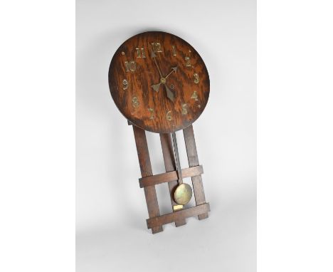 An Oak Arts and Crafts Style Wall Clock Arabic Brass Numerals and Stylised Hands, Complete with Pendulum and Labels for P and