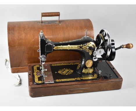 A Manual Singer Sewing Machine In Case 