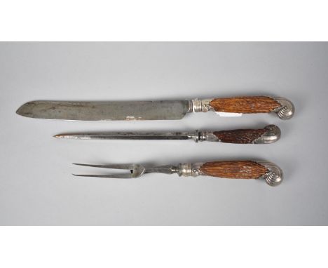 A Late 19th Century Horn handled Silver Mounted Carving Set by Harrison Brothers and Howson 