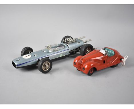 A Vintage German Schuco Clockwork Car, Examico 4001 together with a Further Schuco Example, BMW Formula II 1072 