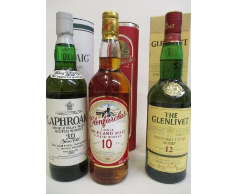 Three bottles of Scotch Whisky to include The Glenlivet, Laphroaig, Glenfarclas 
