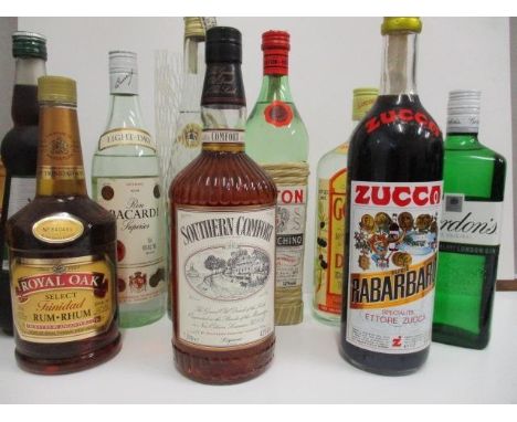 Nine bottles of mixed spirits to include Gordon's Gin, Rum and Southern Comfort 