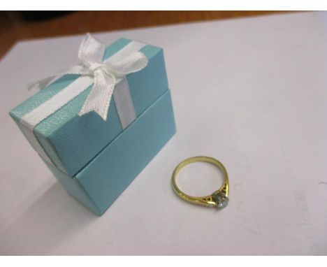 An 18ct gold diamond solitaire ring 