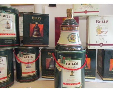 A collection of Bells Scotch whiskey decanters 1996, 93, 94, 92, 95, 97, 98, 91, 88, 89, 90 