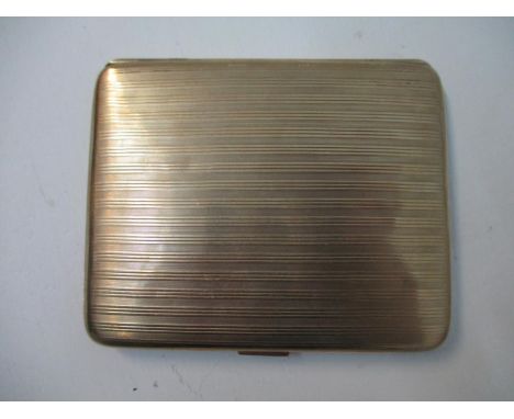 A 1921 9ct gold cigarette case with engine turned decoration, 3 1/4"h x 2 1/2", 71.1g 