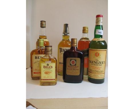 Seven bottles of Scotch Whisky to include Bells, Teachers, Johnnie Walker and Glenlivet 