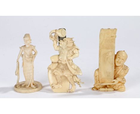 Japanese Meiji period carved ivory okimono, of a seated man holding a long picture, 10cm high, the second also Japanese Meiji