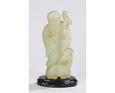 Chinese jade carving, Qing dynasty, of large proportions, of a bearded scholar above a reclining goat, 18.5cm highOverall goo
