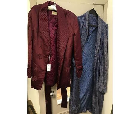 A gentleman's silk smoking jacket in deep plum bearing The Old Peking Silk Company, Hong Kong label to interior and a blue pa