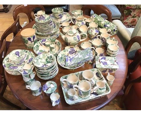 A large Emma Bridgewater dinner service complete with teapot, casserole dish, coffee mugs, teacups, bowls, dinner plates, egg