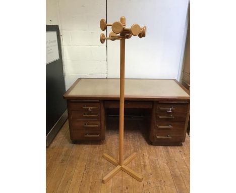 A light oak hallstand with eight hanging pegs in a radiating arrangement (165cm)