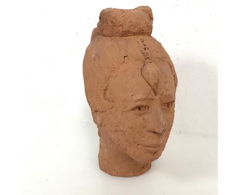 A Studio Pottery clay bust of an East Asian Male Head, stamped to interior and verso, CMV (29cm x 15cm x 19cm)