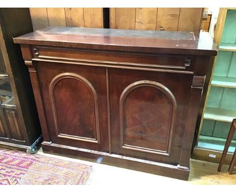 A Victorian mahogany sideboard, lacking superstructure, fitted frieze drawer above a pair of panel doors, with single shelf t