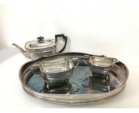 An Epns tea service including teapot (13.5cm x 28cm x 13cm) with matching sugar bowl and milk jug, each piece with initial S,