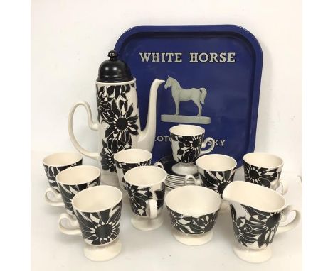 A Carltonware coffee service including a coffee pot (30cm x 22cm x 11cm), eight coffee cups and saucers, sugar bowl, milk jug